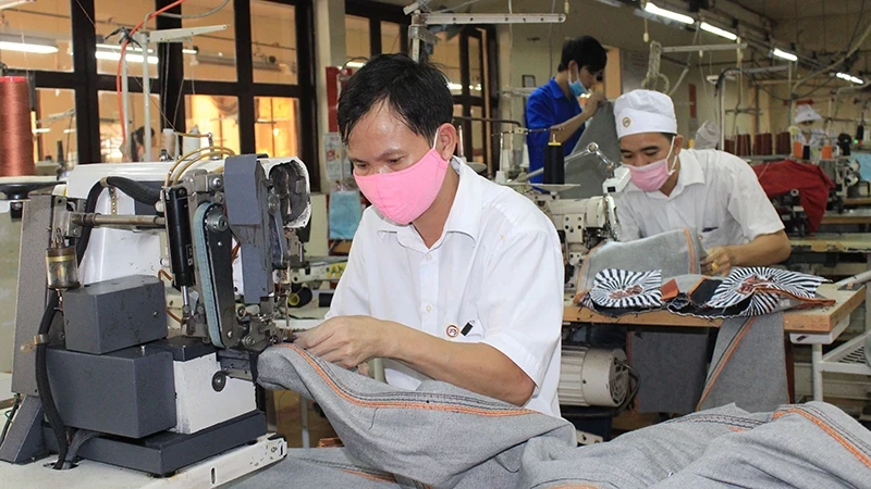 Workers at Protrade Garment Joint Stock Company in Binh Duong Province.