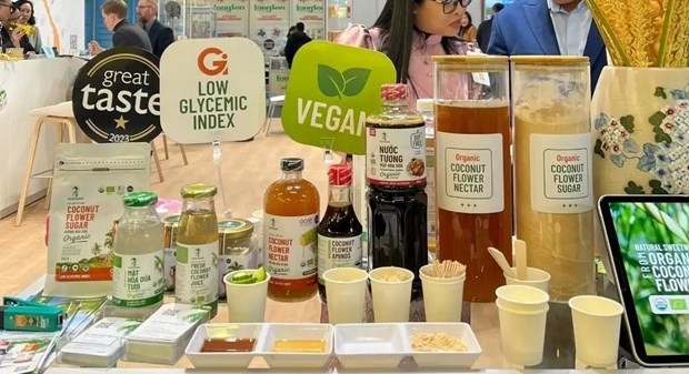 Liquid aminos, sugar, and vinegar from coconut flower by Sokfarm Vietnam showcased at Biofach 2024. (Photo: VNA)