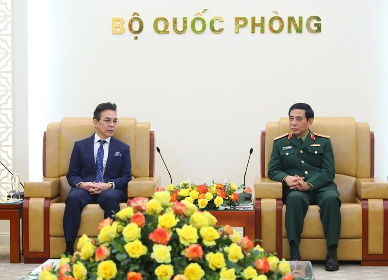 General Phan Van Giang and Ambassador Nikorndej Balankura.