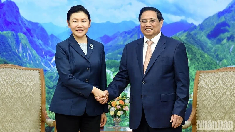 PM Pham Minh Chinh and Chinese Minister of Justice He Rong (Photo: NDO)