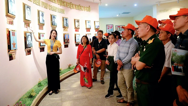 Nguyen Viet Hang guides visitors to Dien Bien Phu Historical Victory Museum.