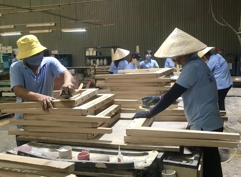 The production of wood products at Minh Duong Furniture Corporation in Binh Duong Province.