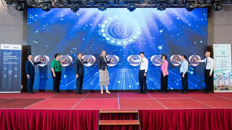 The delegates press the buttons to officially launch the Skills Forecast for Vietnam’s Port Industry during the 2024-2028 period. (Photo courtesy of Australian Embassy in Vietnam)