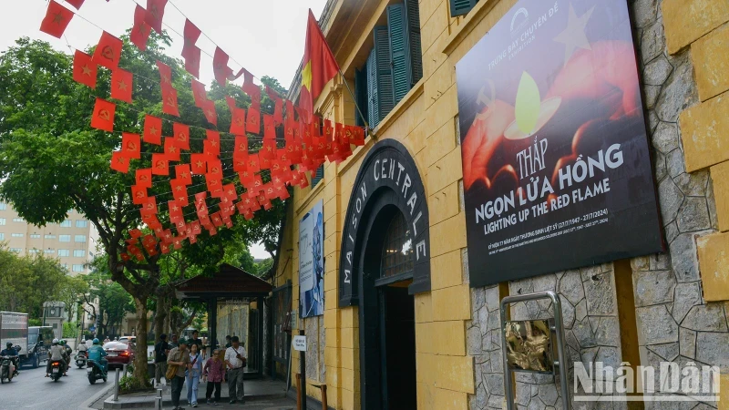 The exhibition is set within the Hoa Lo Prison Relic Site on Hoa Lo Street, Hai Ba Trung District, Hanoi.