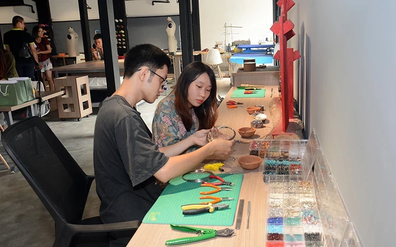 Young people working at UPGen Creative Space in Luong Yen, Hanoi. (Photo: DANG ANH)