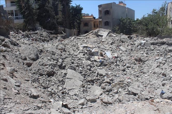 Building destroyed in Israeli Airstrike in Houla, Lebanon, on July 21, 2024. (Photo: Xinhua/VNA)