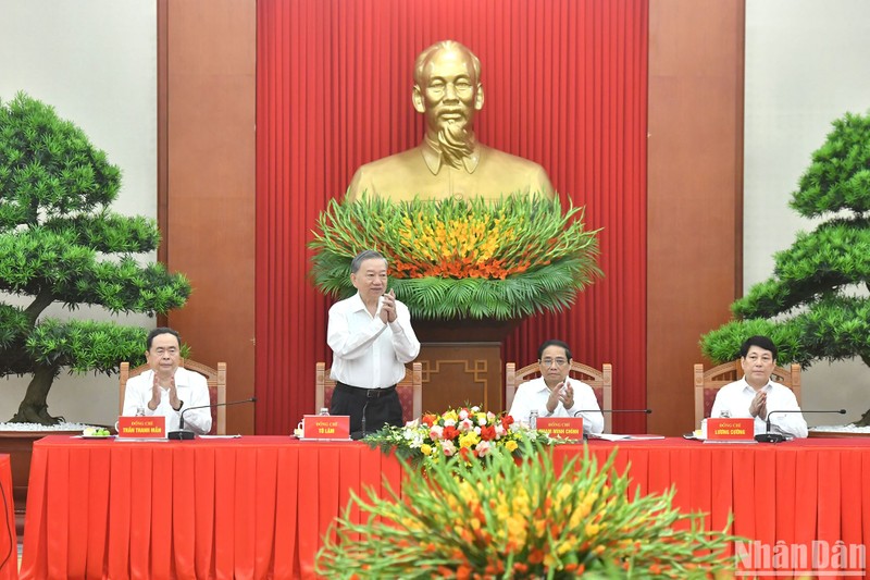 Party General Secretary and President To Lam and other high-level leaders chair the meeting with current and former Party and State leaders.