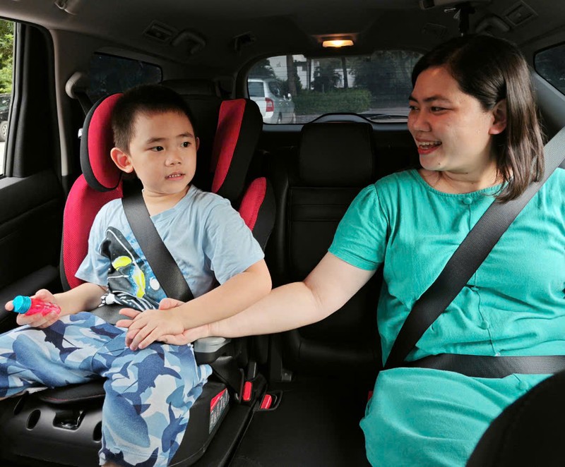 Children must be seated in the rear of a car and child safety restraints (CRS) must be used. 