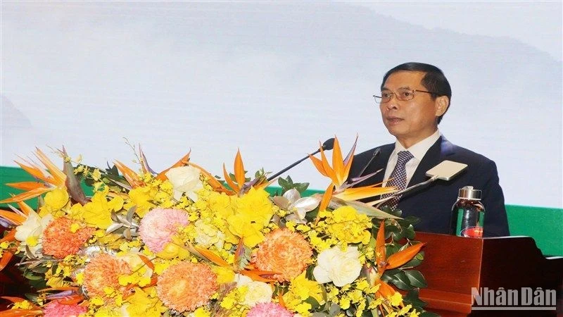 Deputy Prime Minister and Minister of Foreign Affairs Bui Thanh Son speaks at the opening ceremony for the symposium.