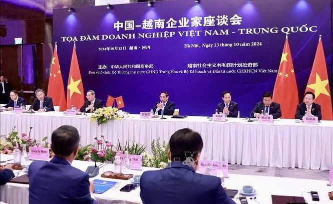 At the Vietnam-China business workshop (Photo: VNA)