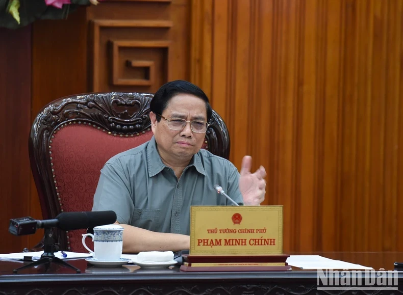 Prime Minister Pham Minh Chinh speaks at the meeting. (Photo: NDO)