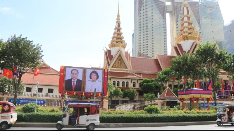 The portraits of the NA Chairman Tran Thanh Man and President of the Cambodian NA Samdech Khuon Sudary are prominently placed in front of the NA headquarters in Phnom Penh. (Photo: Nguyen Hiep)