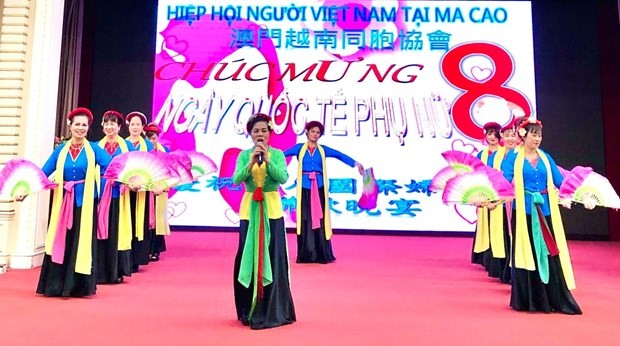 A performance by the Vietnamese People’s Association in Macau at the celebration of the International Women’s Day on March 12. (Photo: VNA)