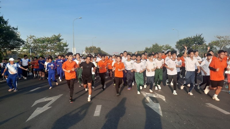Athletes participate in the Olympic Run Day for Public Health