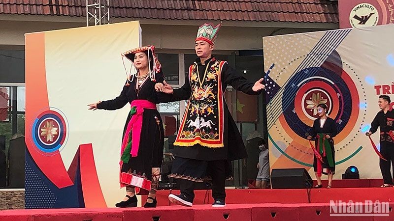 Performance of national costumes at the Vietnam National Village for Ethnic Culture and Tourism.