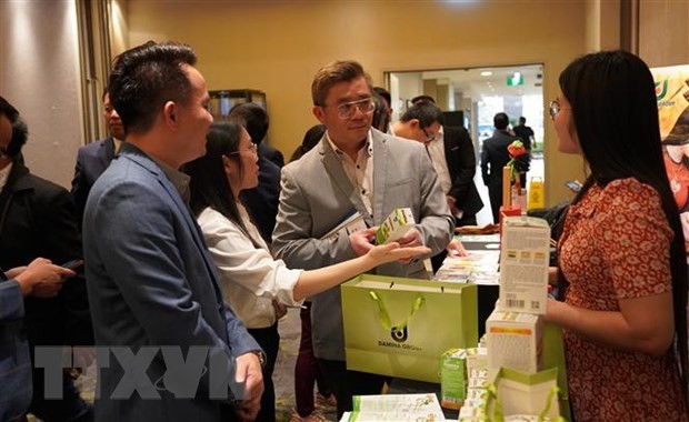 At the Vietnamese trade-investment promotion event in Australia on September 11 (Photo: VNA)