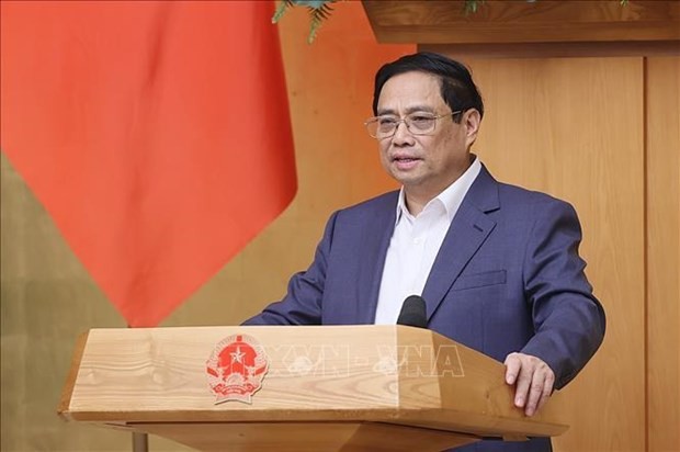 Prime Minister Pham Minh Chinh addresses the meeting (Photo: VNA)