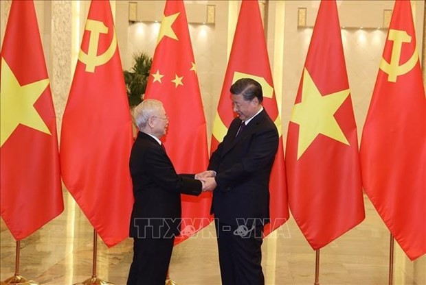 General Secretary of the Communist Party of China (CPC)'s Central Committee Xi Jinping (R) welcomes General Secretary of the Communist Party of Vietnam (CPV)'s Central Committee Nguyen Phu Trong who leads a high-level Vietnamese delegation to visit China in late October, early November 2022 (Photo: VNA)