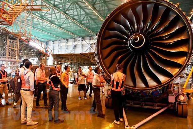 Aviation experts visit aircraft maintenance centre in Hanoi. (Photo: VNA)