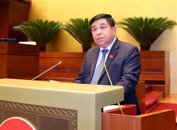 Minister of Planning and Investment Nguyen Chi Dung speaks at the National Assembly's 6th session on October 23. (Photo: VNA)