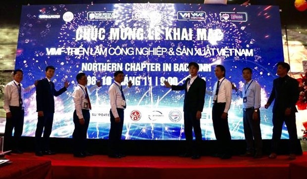 Representatives from agencies and businesses at the opening ceremony of the Vietnam Industrial and Manufacturing Fair (VIMF) 2023. (Photo: VNA)
