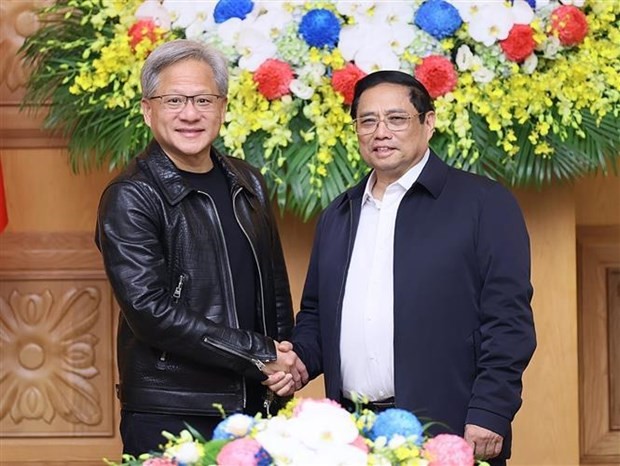 Prime Minister Pham Minh Chinh and President and CEO of Nvidia. (Photo: VNA)