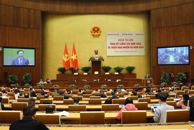 NA Chairman Vuong Dinh Hue speaks at the conference (Photo: VNA)