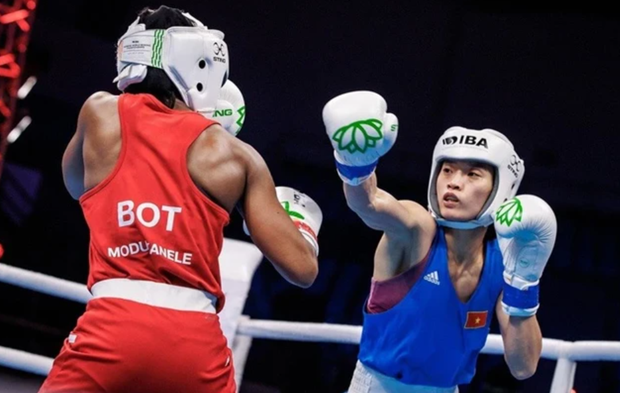 Vietnamese boxer Nguyen Thi Tam (R) is an experienced international fighter. (Photo: VNA)