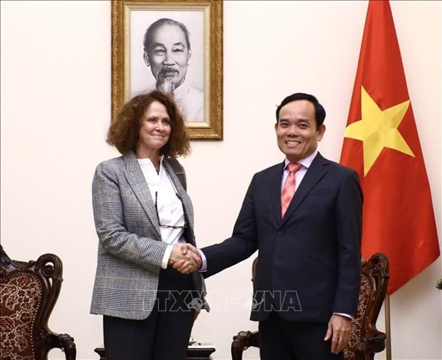 Deputy Prime Minister Tran Luu Quang (R) and WB Country Director Carolyn Turk at their meeting in Hanoi on March 13. (Photo: VNA)