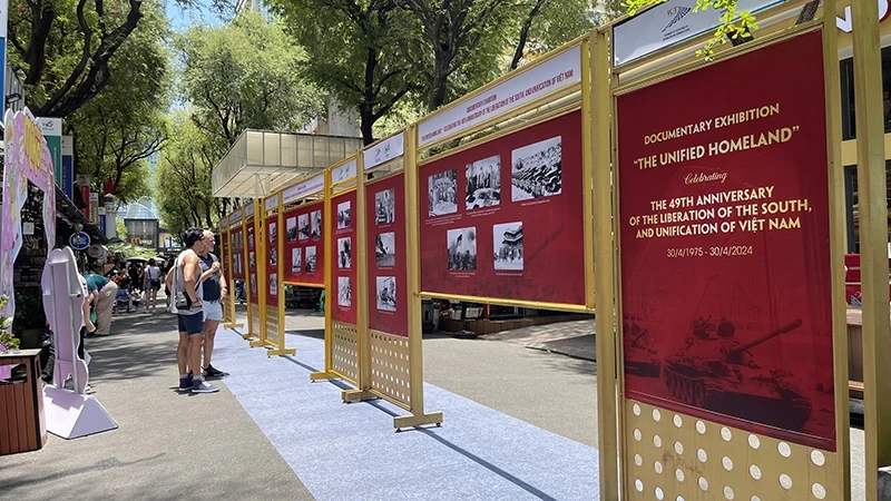 Foreign tourists visit the exhibition at Book Street in Ho Chi Minh City.