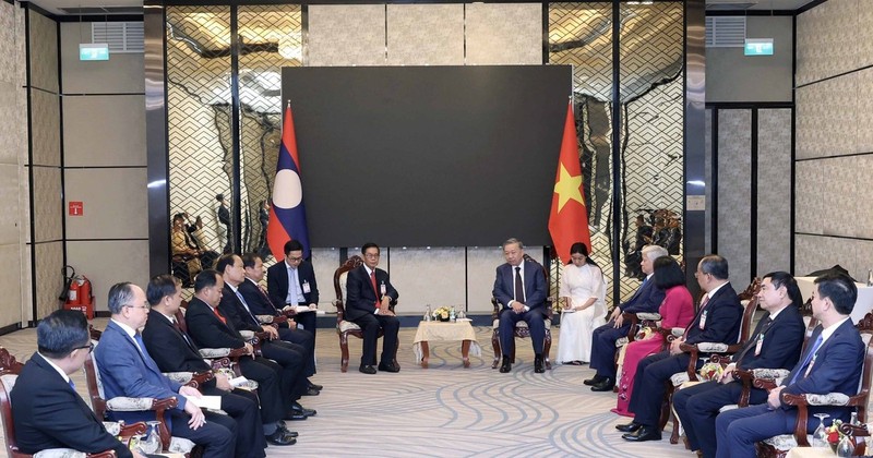 President To Lam meets with Sinlavong Khoutphaythoune, President of the Central Committee of the Lao Front for National Construction (LFNC), in Vientiane on July 11. (Photo: VNA)