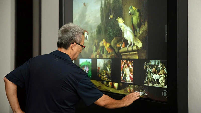 Visitors experience the interactive screen.