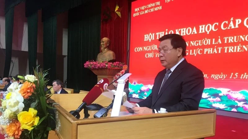 Politburo member Nguyen Xuan Thang, President of the HCMA and Chairman of the Central Theory Council, delivers the opening speech at the workshop.