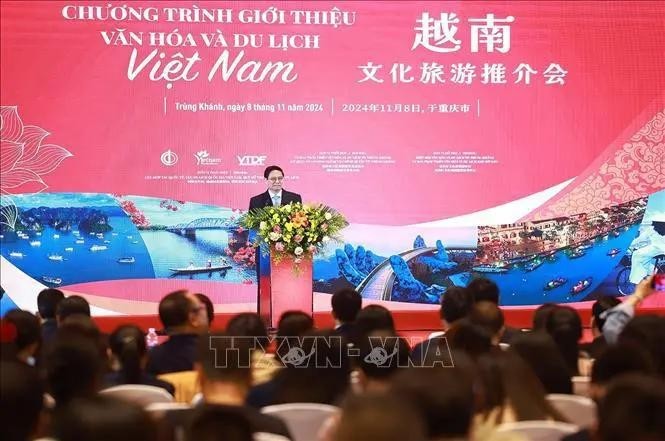 Prime Minister Pham Minh Chinh speaks at a programme introducing Vietnam’s culture and tourism in Chongqing city on November 8. (Photo: VNA)