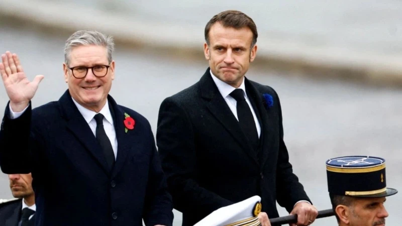 Keir Starmer and Emmanuel Macron attend a ceremony marking Armistice Day in Paris on the morning of November 11, 2024. (Photo: Challenges/VOV)