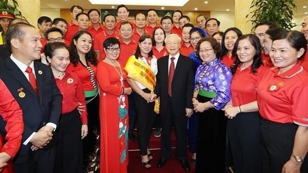 Party General Secretary Nguyen Phu Trong (front, fourth from right) and VRC delegates at the meeting. (Photo: VNA)