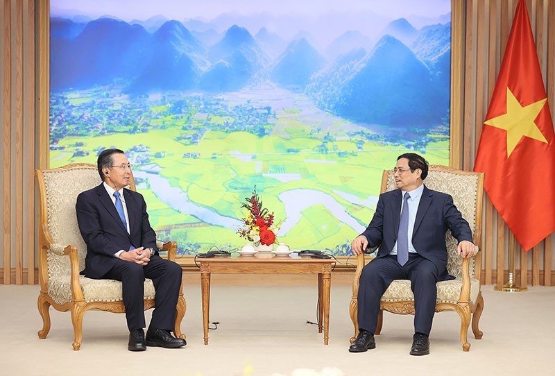 PM Pham Minh Chinh (R) and JETRO Chairman Ishiguro Norihiko. (Photo: VNA)