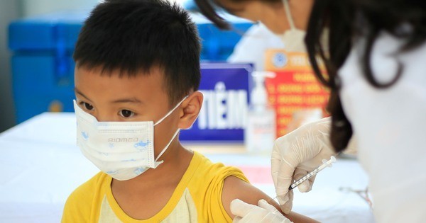 A child gets vaccinated against COVID-19.