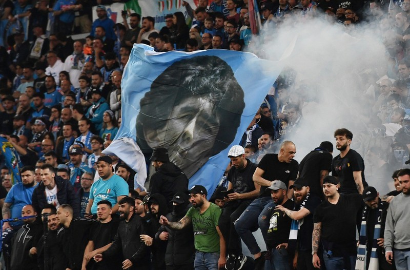 Napoli fans with a Diego Maradona flag - Serie A - Udinese v Napoli - Dacia Arena, Udine, Italy - May 4, 2023. (Photo: Reuters)