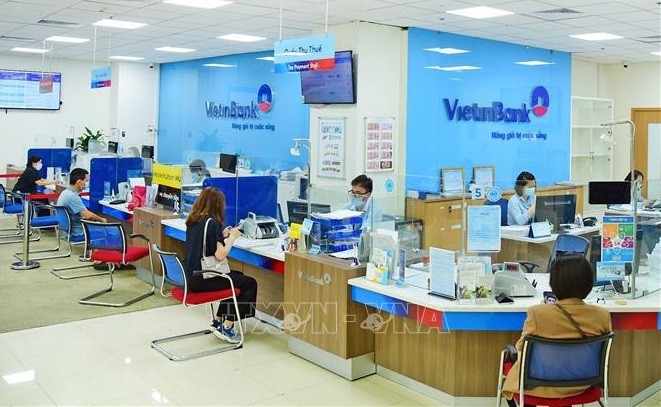 Almost all banks cut 6-month deposit interest rate to below 8%/year (Photo: VNA)