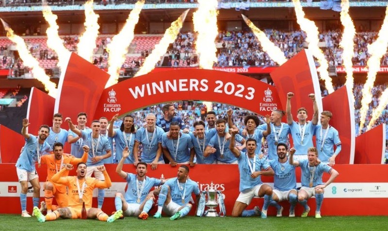 Manchester City players celebrate with the trophy after winning the FA Cup - FA Cup Final - Manchester City v Manchester United - Wembley Stadium, London, the UK - June 3, 2023. (Photo: Reuters)