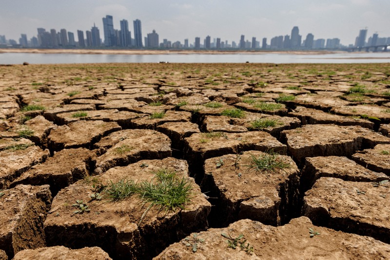 Cracks run through the partially dried-up river bed of the Gan River, a tributary to Poyang Lake during a regional drought in Nanchang, Jiangxi province, China, August 28, 2022. (Photo: REUTERS)
