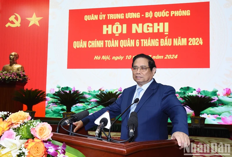 Prime Minister Pham Minh Chinh addresses the national political-military conference on July 10 (Photo: NDO)