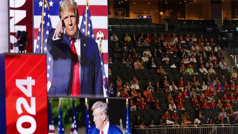 Screens showing Republican presidential candidate and former U.S. President Donald Trump on Day 1 of the Republican National Convention (RNC), at the Fiserv Forum in Milwaukee, Wisconsin, US, July 15, 2024. (Photo: REUTERS)