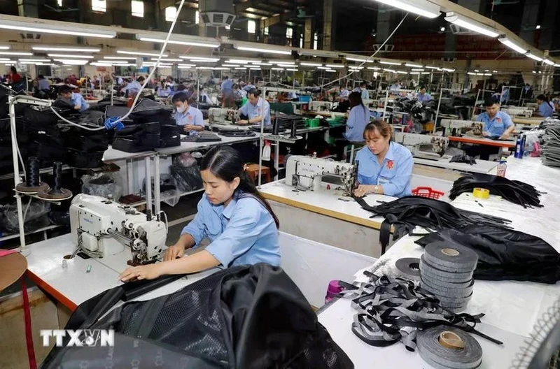 Chinese media also highlighted Vietnam’s proactive efforts in industrial upgrade and transformation, focusing on switching from traditional labour-intensive to technology-driven industries. (Photo: VNA)