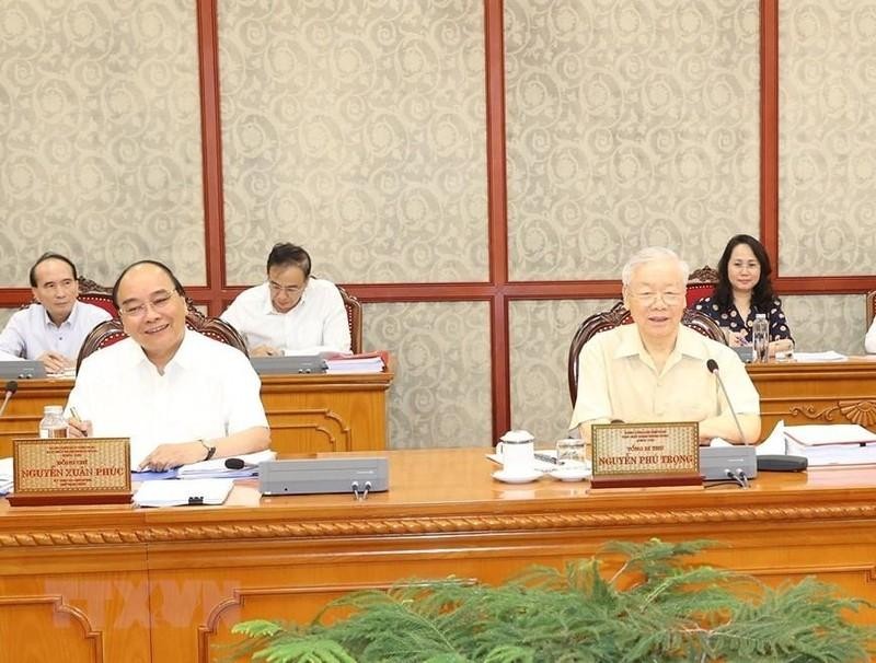 Party General Secretary Nguyen Phu Trong and President Nguyen Xuan Phuc at the meeting (Photo: VNA)