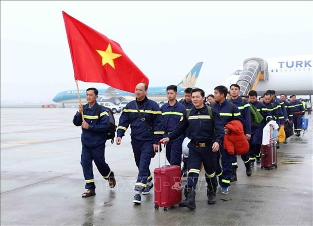 The Ministry of Public Security's search and rescue group return home on February 19 after fulfilling their tasks. (Photo: VNA)