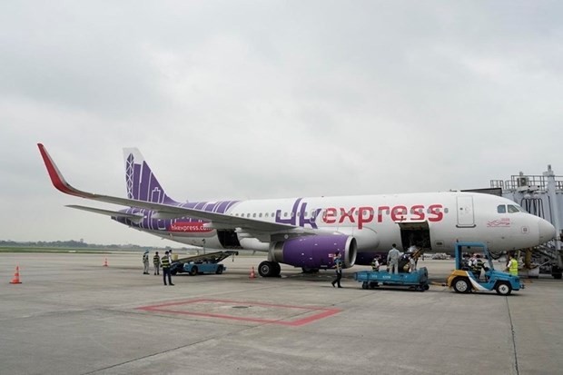 A plane of Hong Kong Express Airways at Noi Bai International Airport in Hanoi (Photo: VNA)