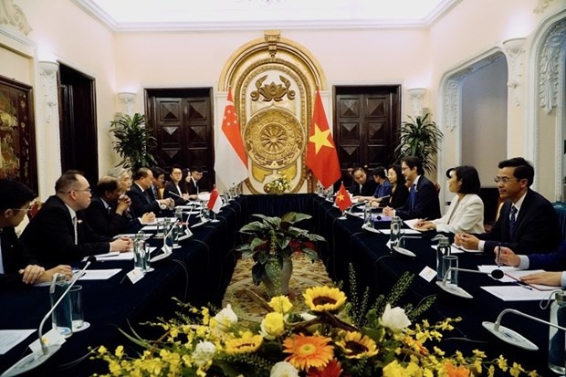 The 15th Vietnam - Singapore Political Consultation takes place in Hanoi on May 18.(Photo: Courtesy of Foreign Affairs Ministry)