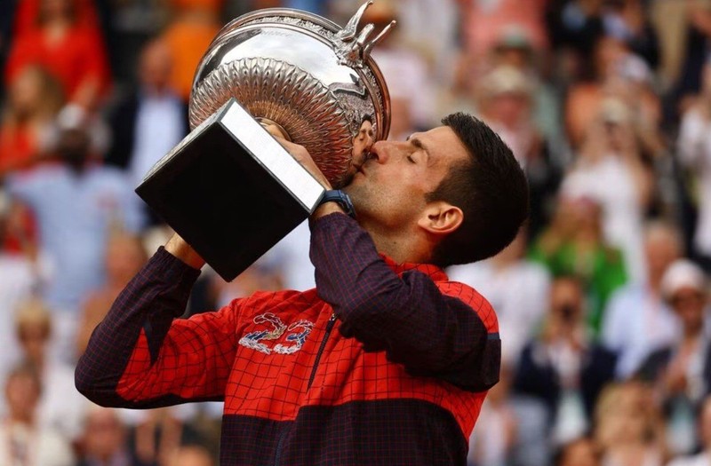 Serbia's Novak Djokovic kisses the trophy after winning the French Open - French Open - Roland Garros, Paris, France - June 11, 2023. (Photo: Reuters)